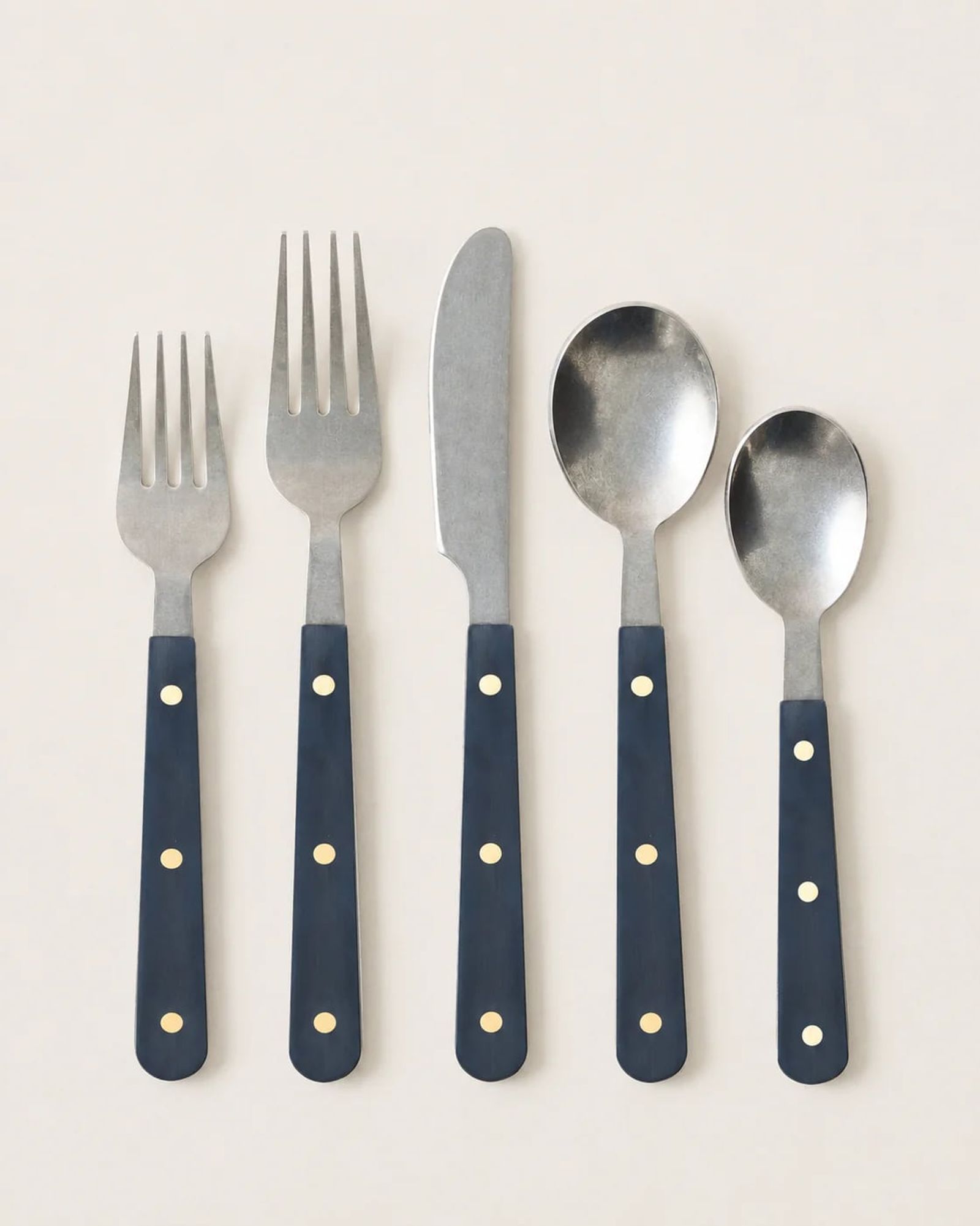 Mixed-metal flatware with hammered, beaded and inlaid handles