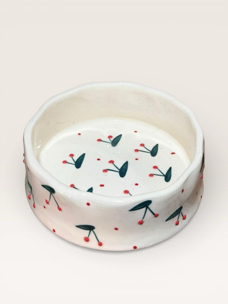 Hand-painted stoneware bowl with a cherry pattern
