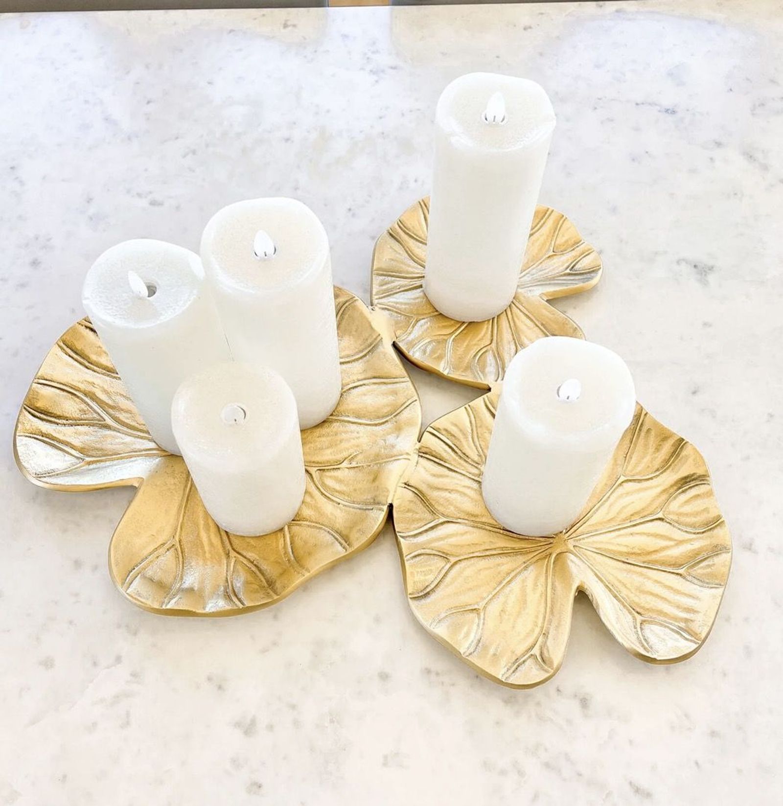 Gold lotus-leaf tea-light holders