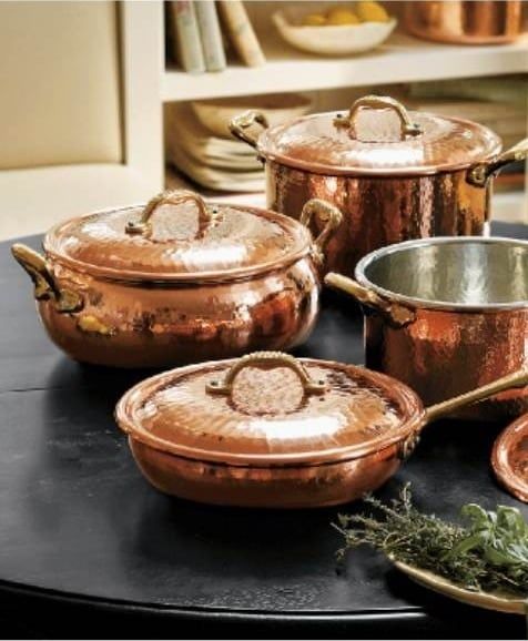 Hammered copper saute pan with a helper handle for tableside service