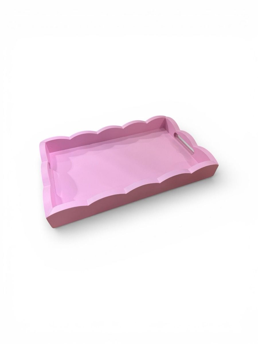 Pink scalloped enamel-coated wooden serving tray