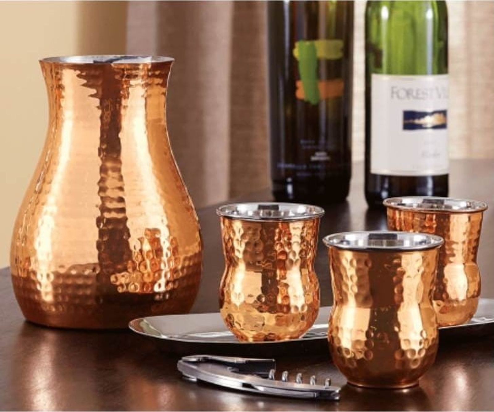 Hammered copper tumblers with grapefruit cocktails
