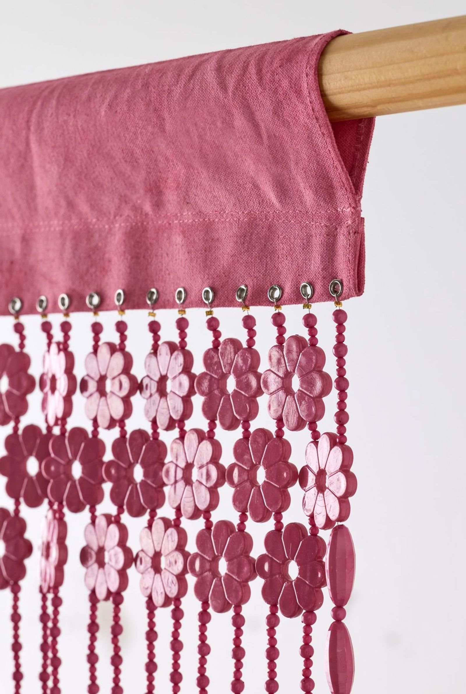 Detail of a hand-beaded pink valance