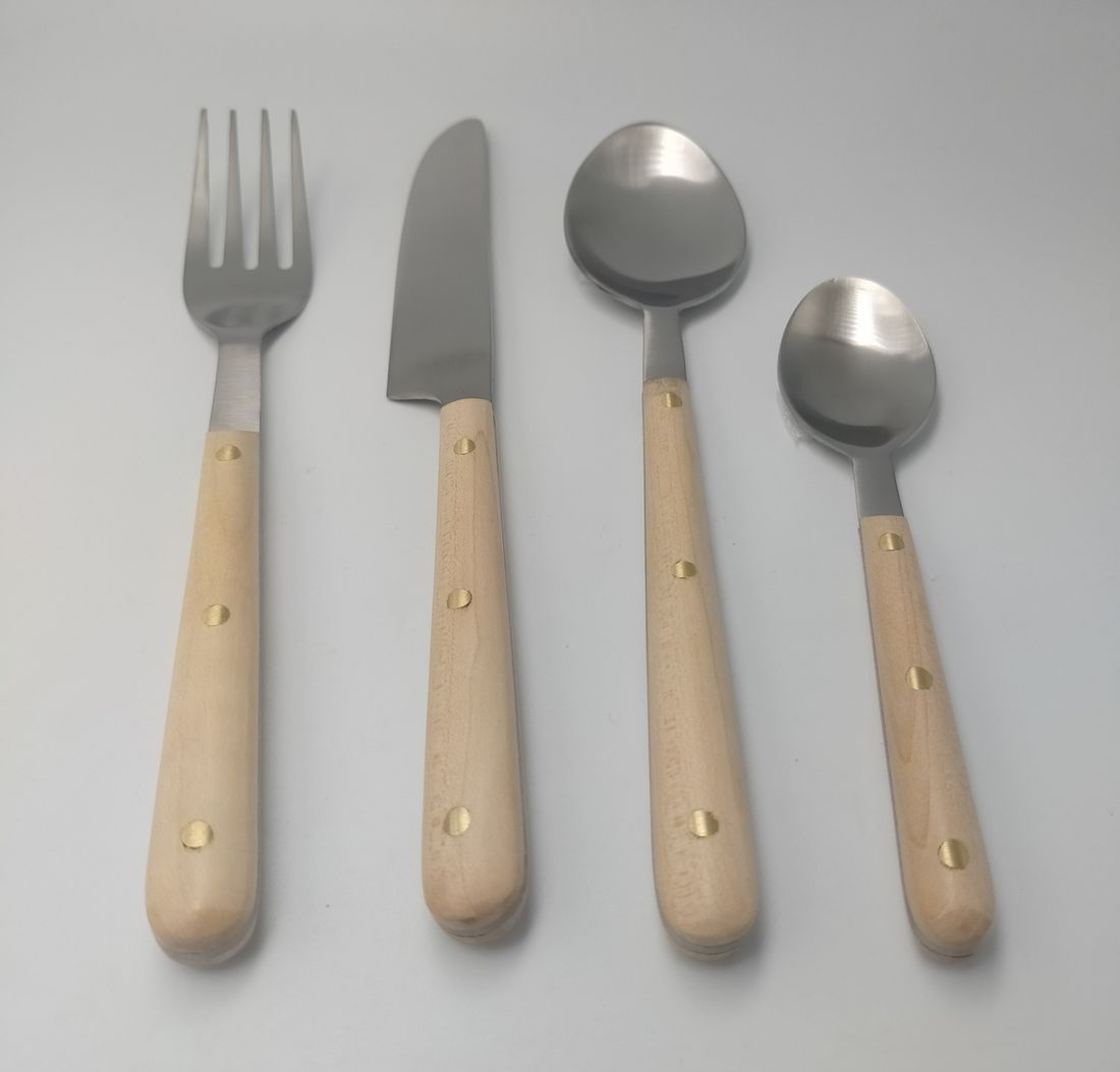 Cream bone-handle flatware set