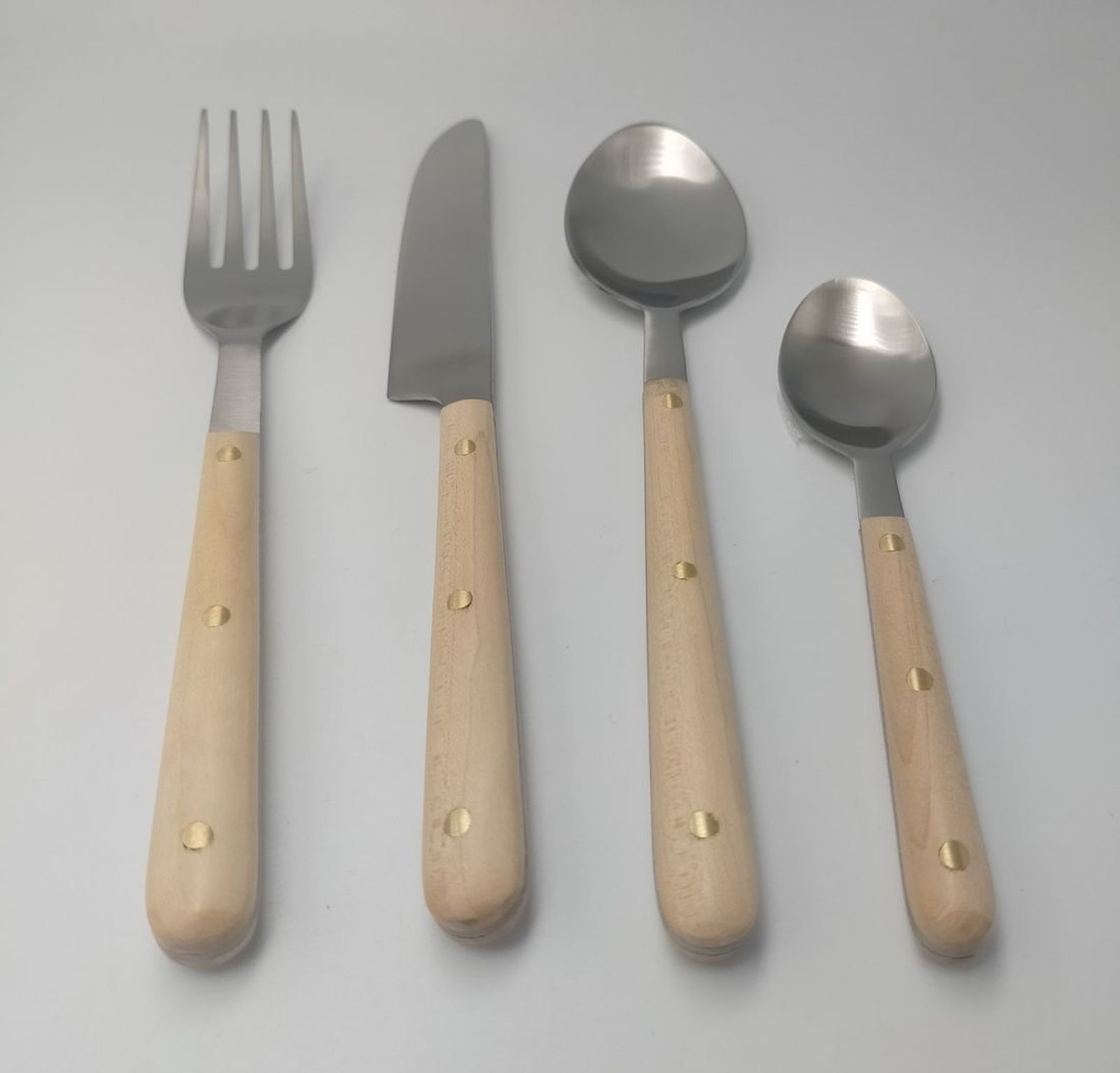 Cream bone-handle flatware set