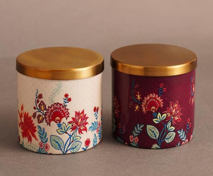 Floral-printed ceramic storage jars with brushed gold lids