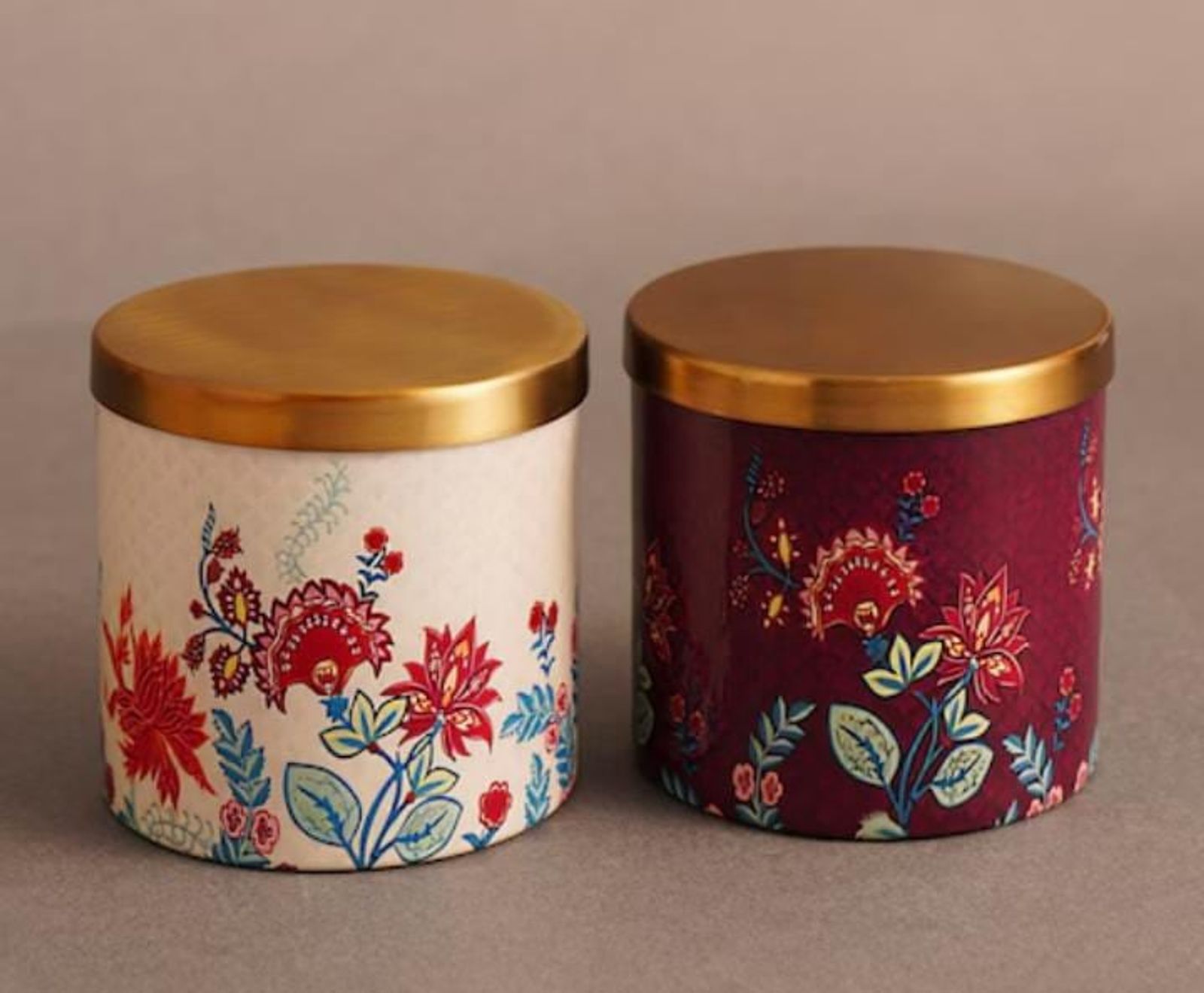 Floral-printed ceramic storage jars with brushed gold lids