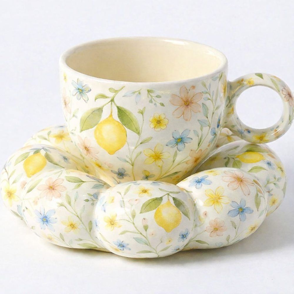Floral lemon-print ceramic cup and saucer