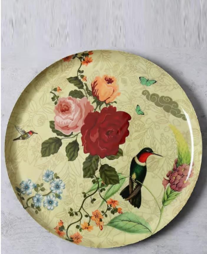 Decorative plate with a printed hummingbird and rose pattern
