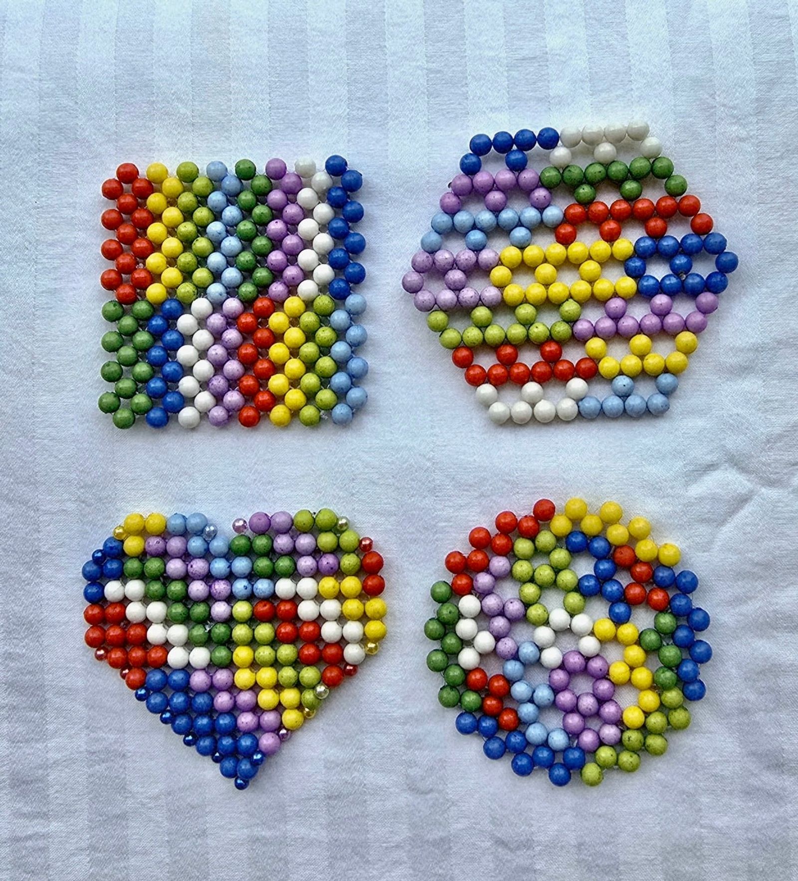 Set of hand-beaded glass coasters