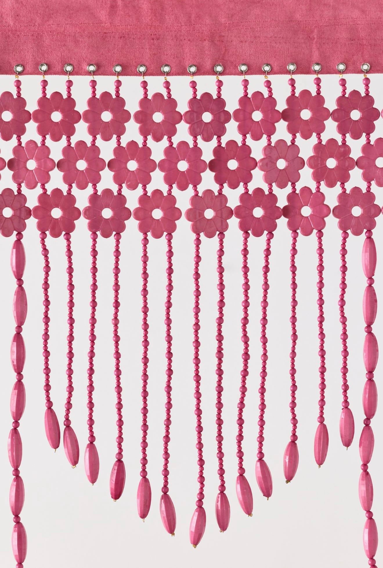 Pink hand-beaded valance with a flower motif