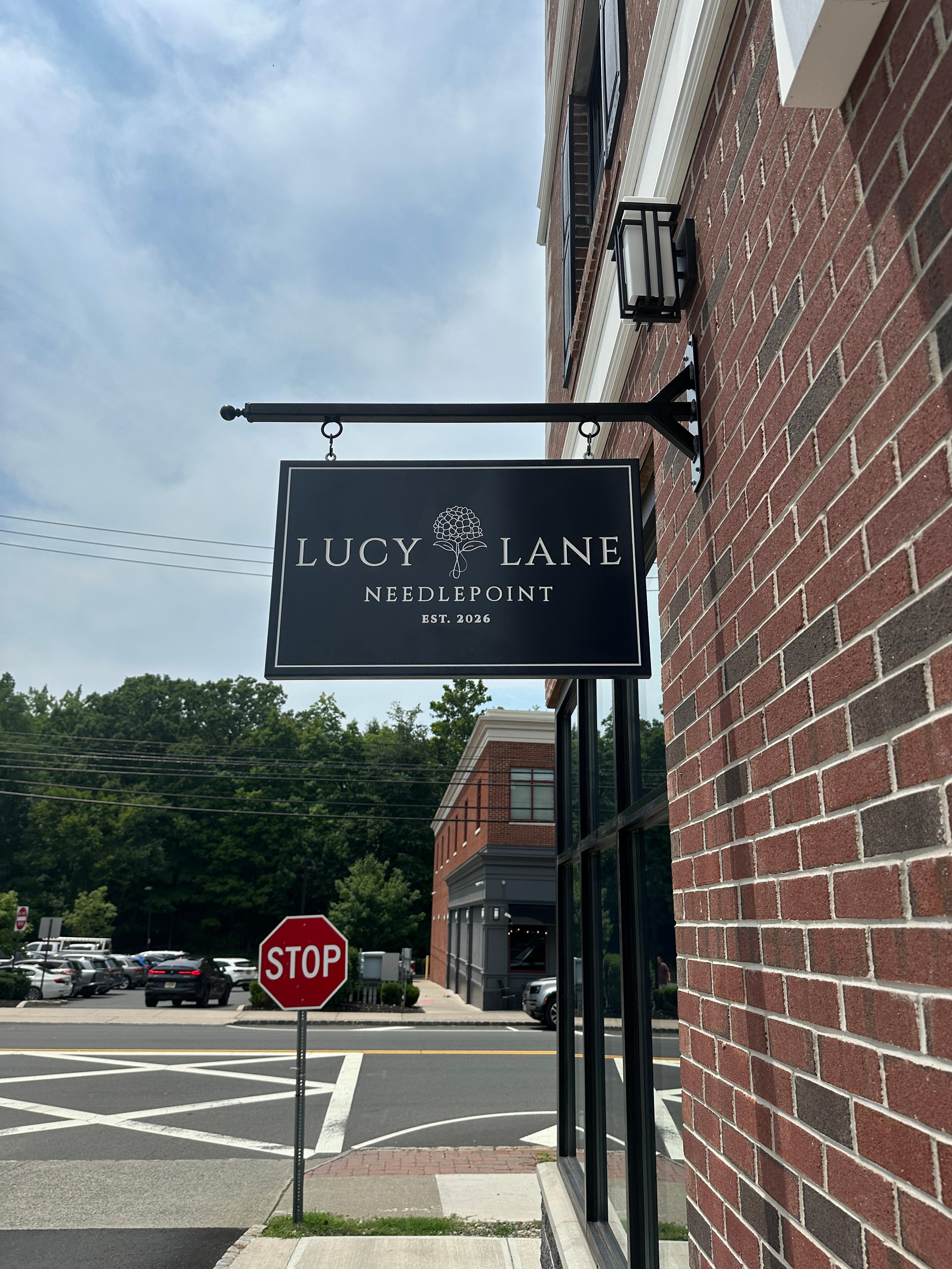 Lucy Lane, we fabricated a sign that reflects the artisanal nature of their business: clean, durable, and sophisticated.