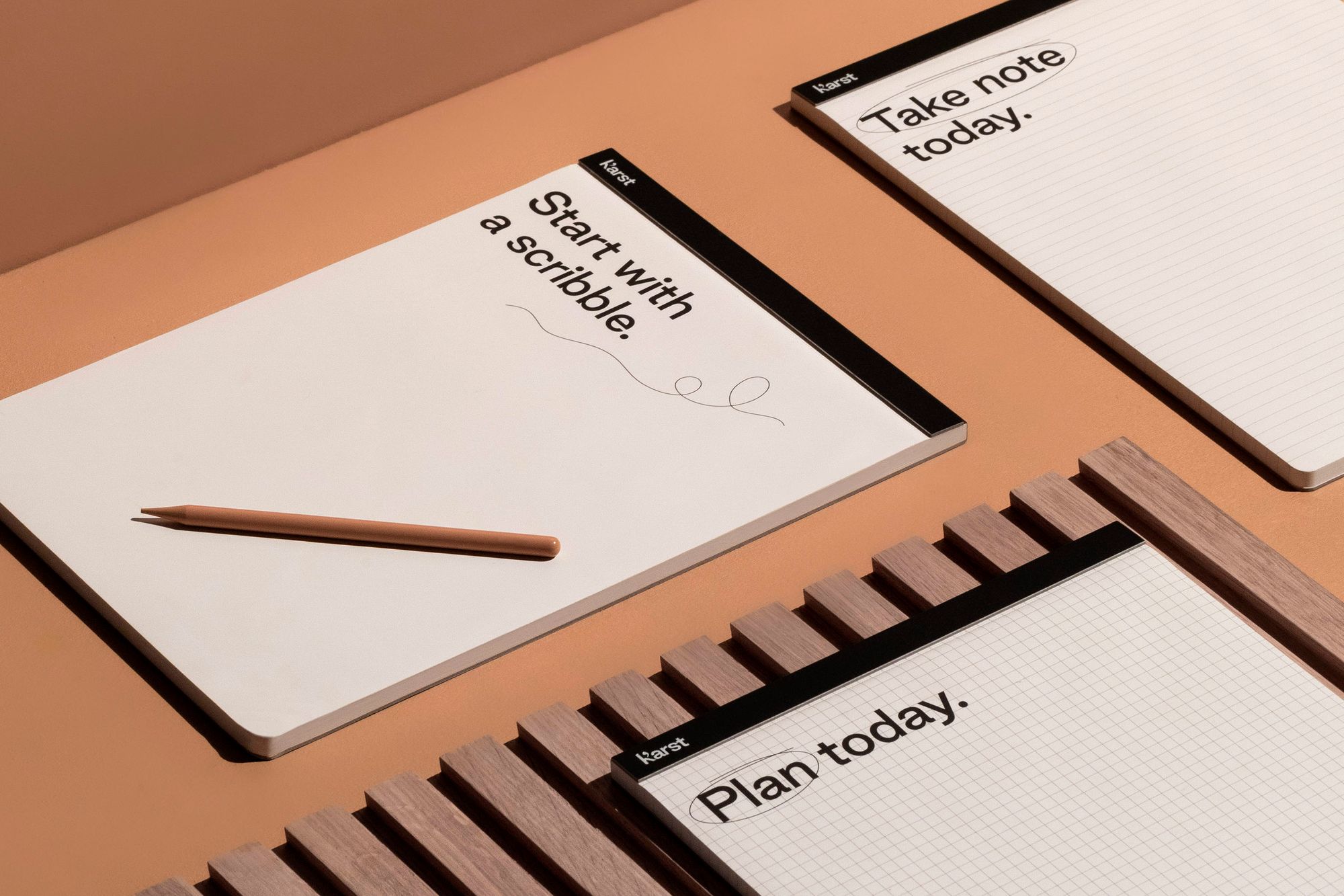 flat lay of a4 notepads in lined blank and grid paper