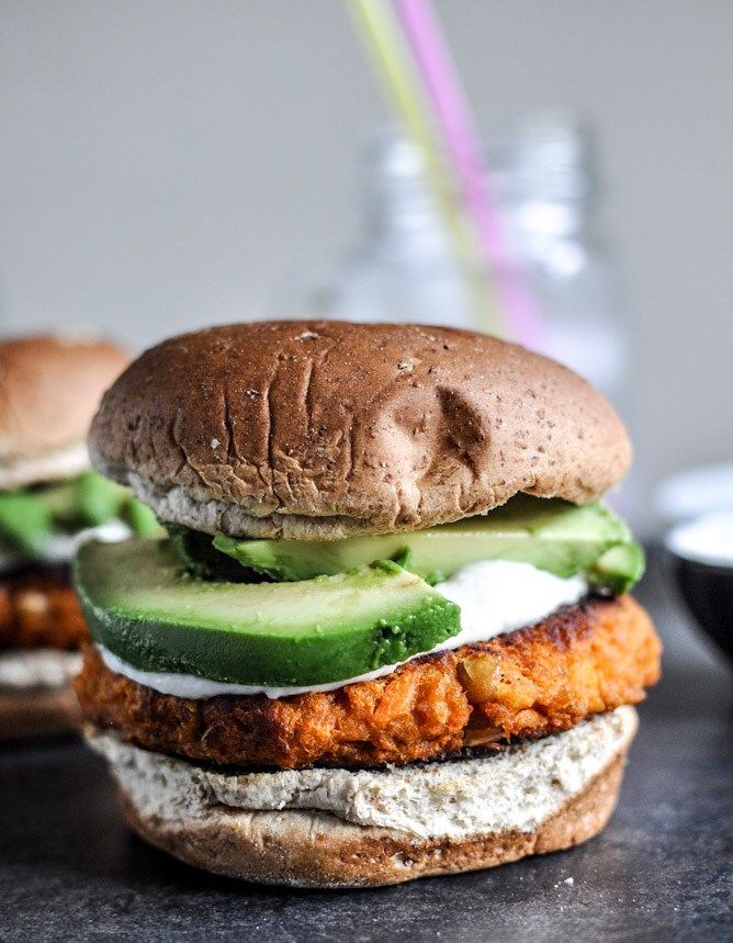 Smoky sweet potato burgers with roasted garlic cream and avocado