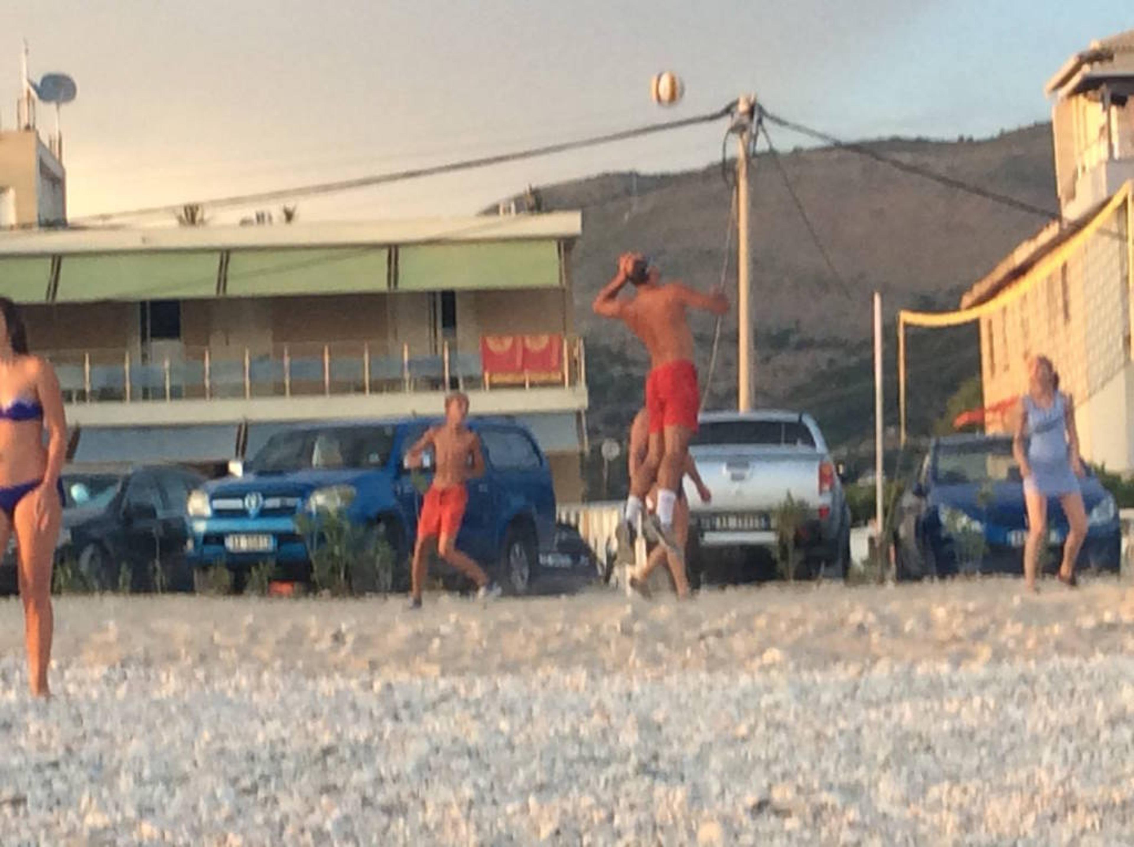 People playing Volleyball infront of Vila Borsh