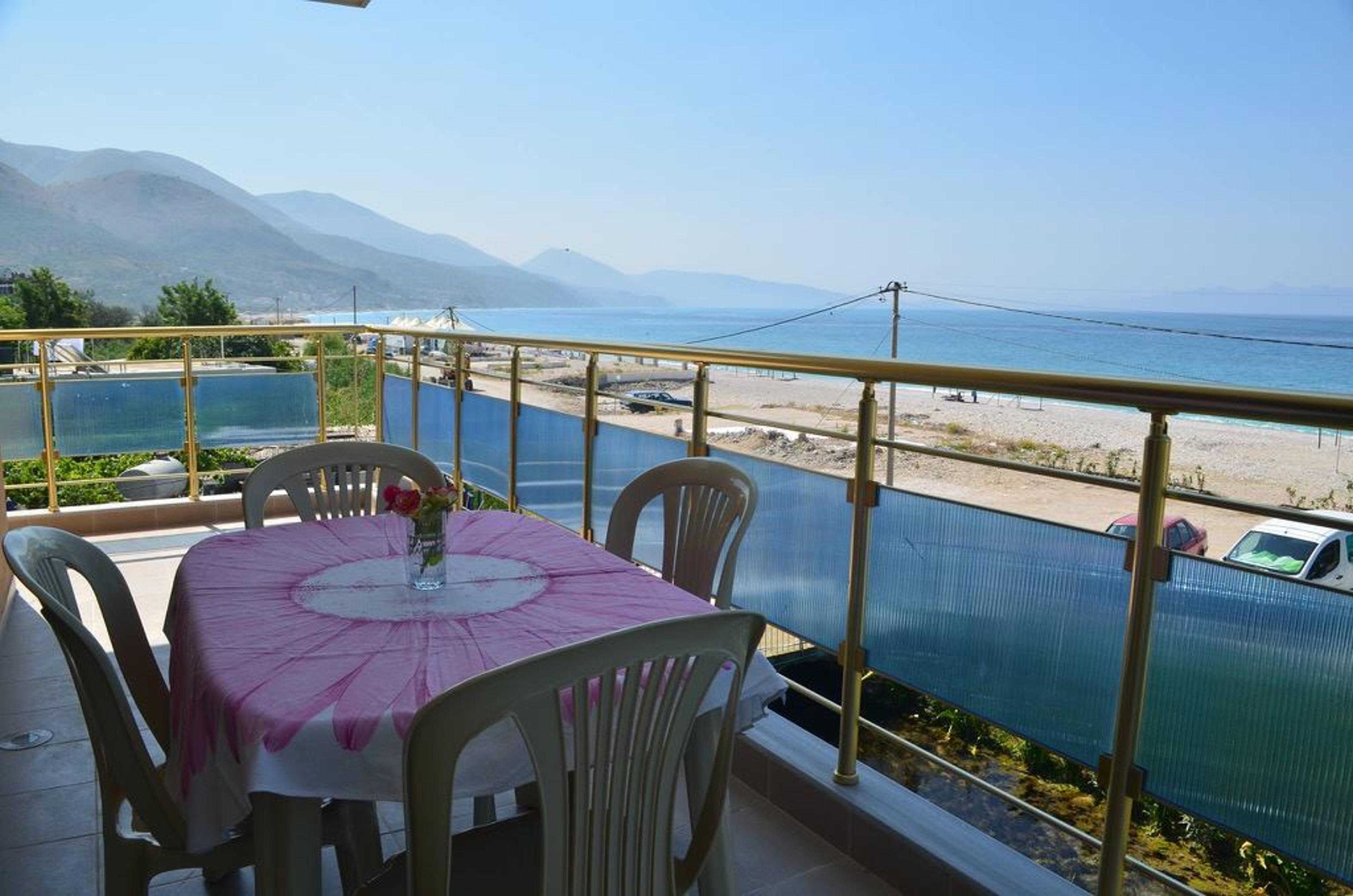 Balcony with seaview and table and chairs