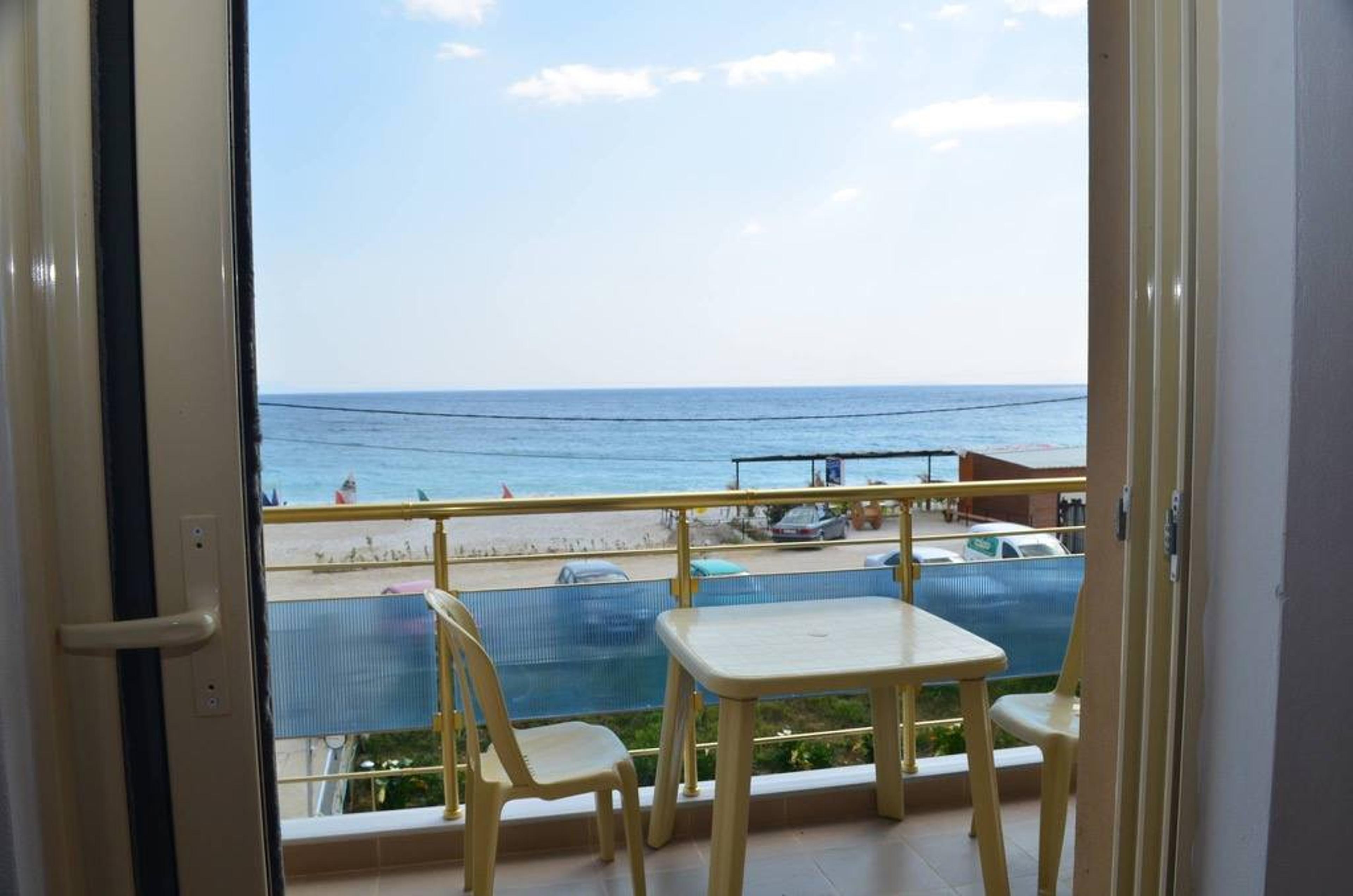 Balcony with seaview and table and chairs