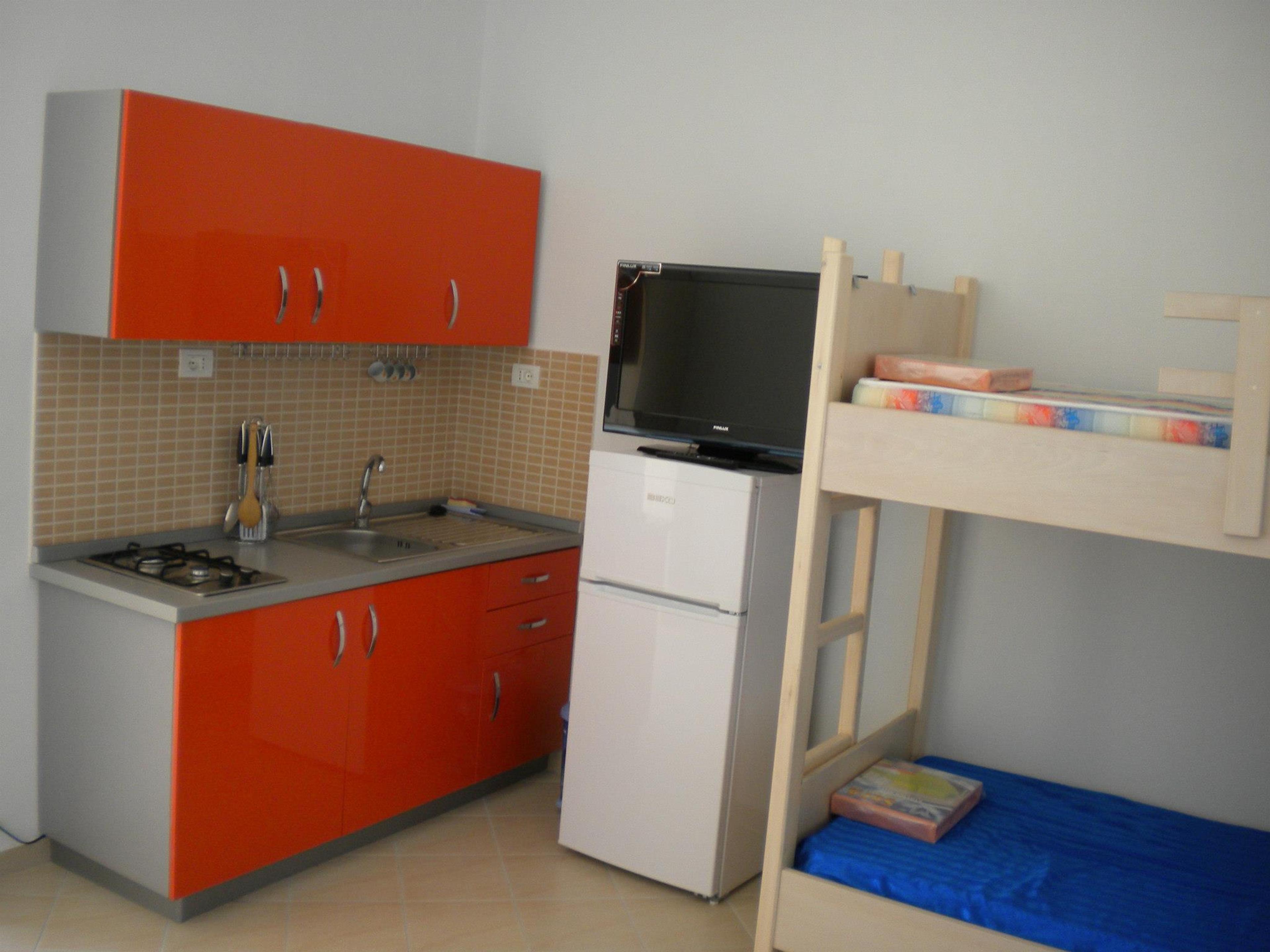 One Bedroom with double bed, bunk bed and kitchen