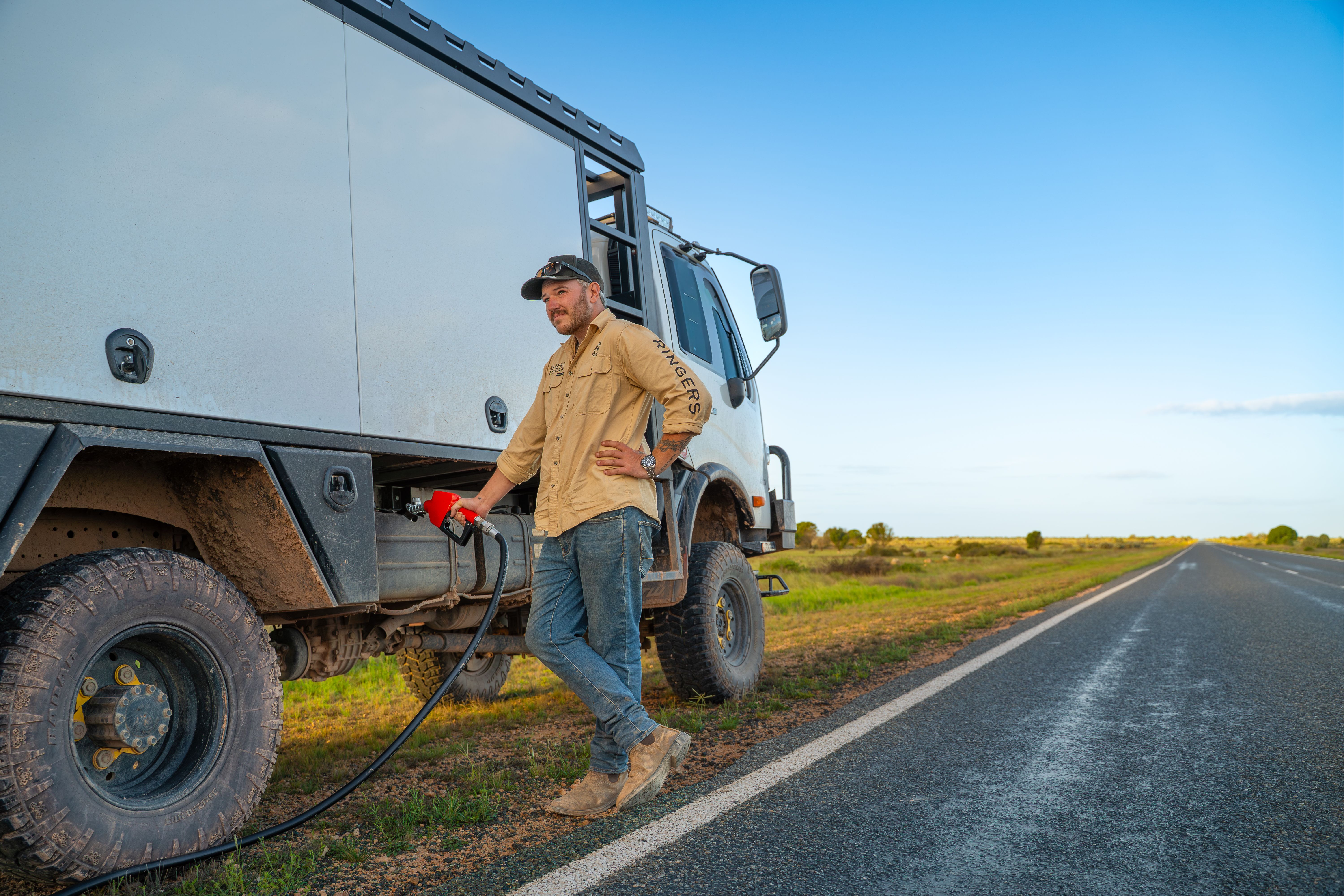 Josh Leonard refueling his Hino 4WD truck