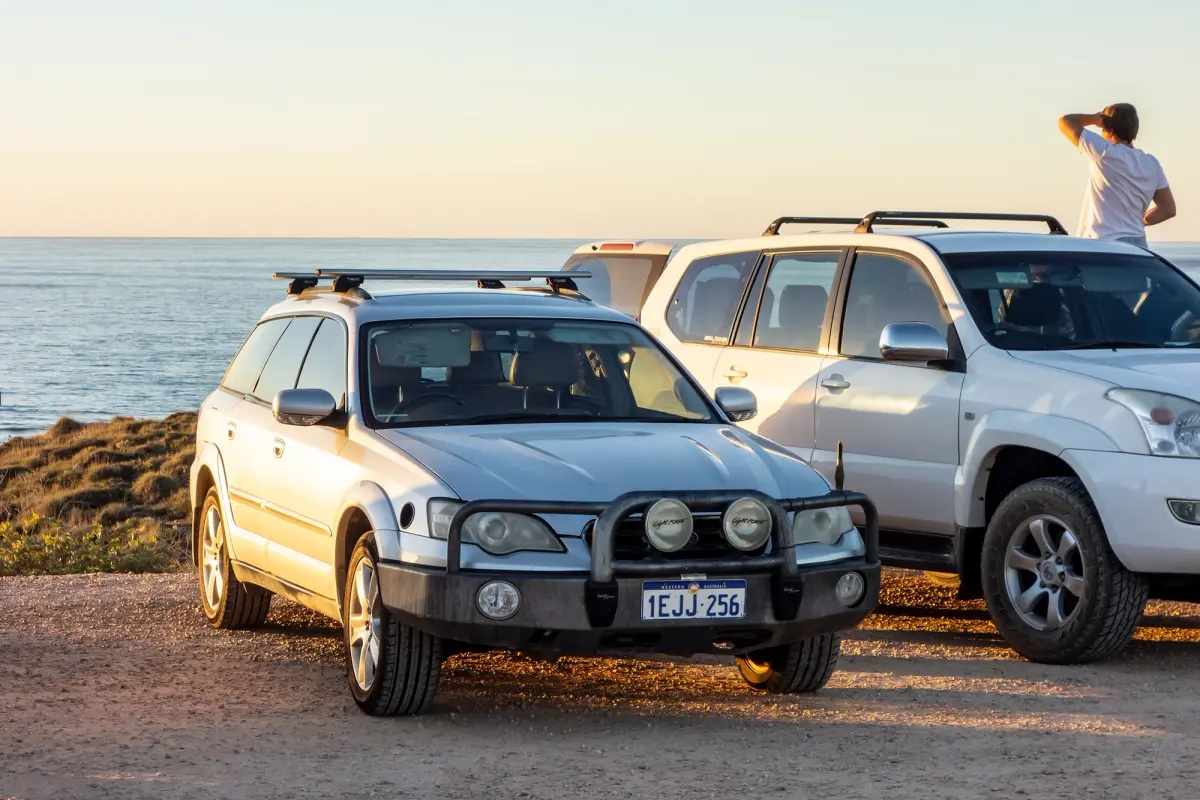 A Subaru AWD parked at a beach lookout
