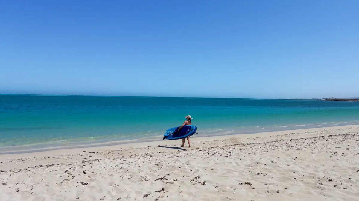 on the beach with a SUP