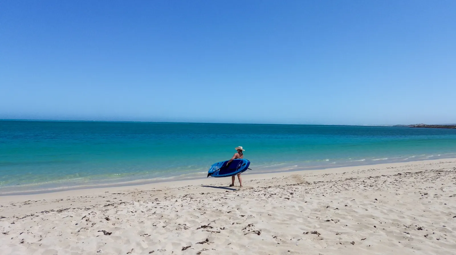 on the beach with a SUP
