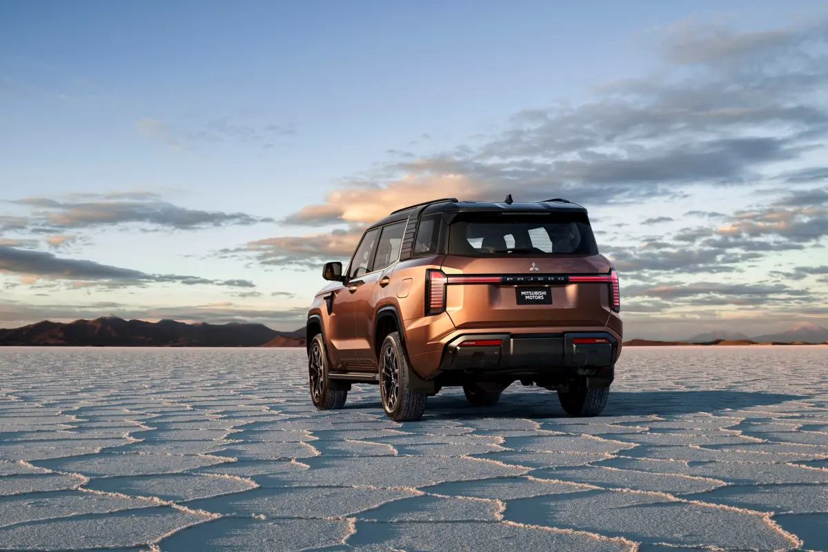 A copper Mitsubishi Pajero on a salt flat