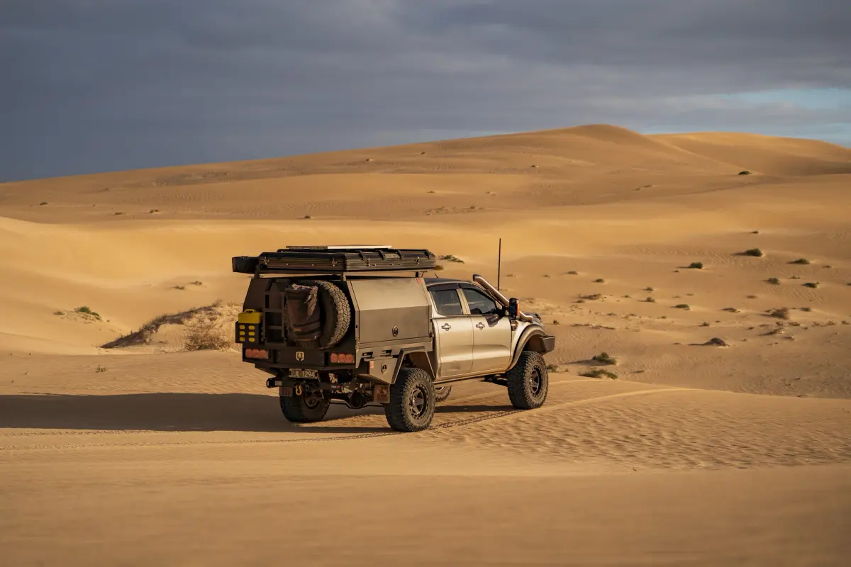 A 4X4 Ford Ranger parked on sand at Fowlers Bay