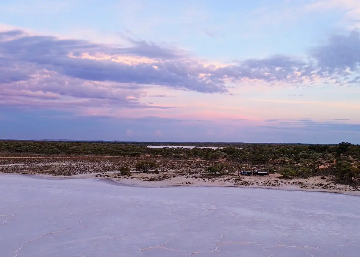 caravan camped at a salt flat