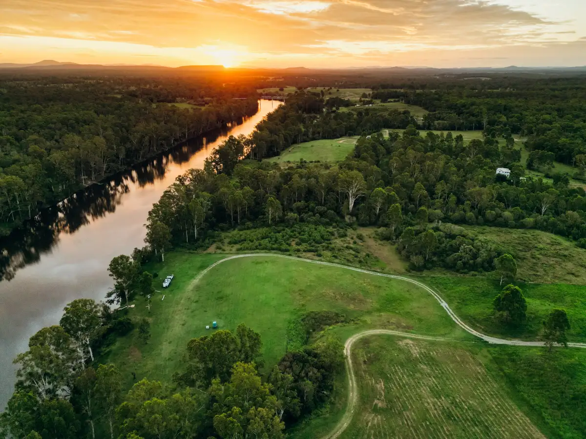 aerial view of campsite by a river