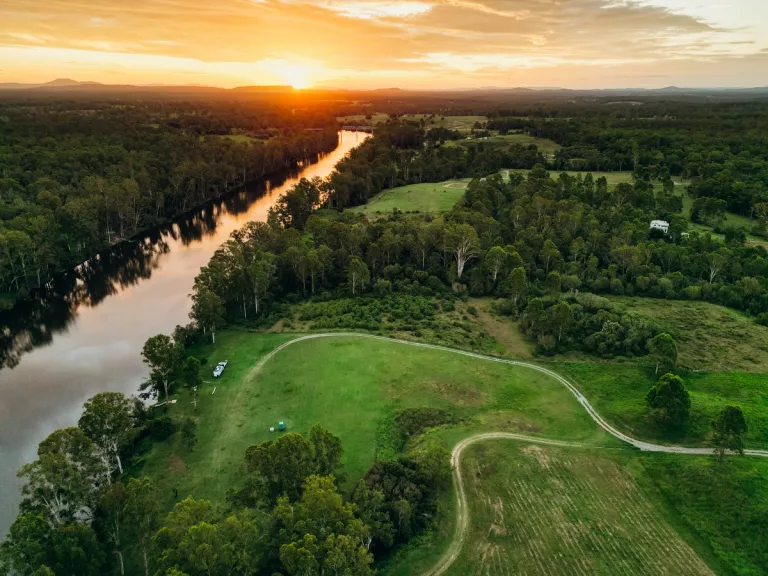 aerial view of campsite by a river