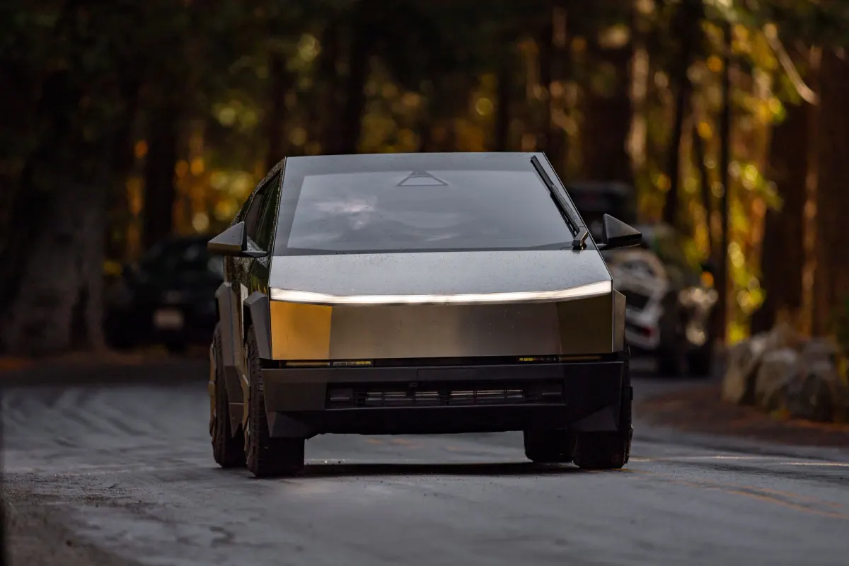 A Tesla Cybertruck on a dirt road