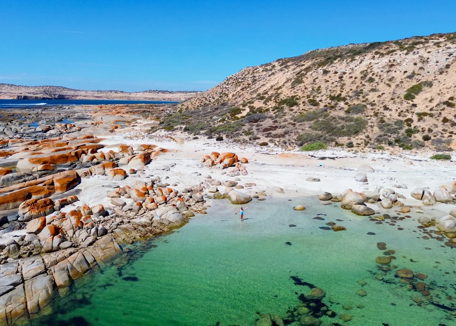 Swimming on a rocky beach in Australia