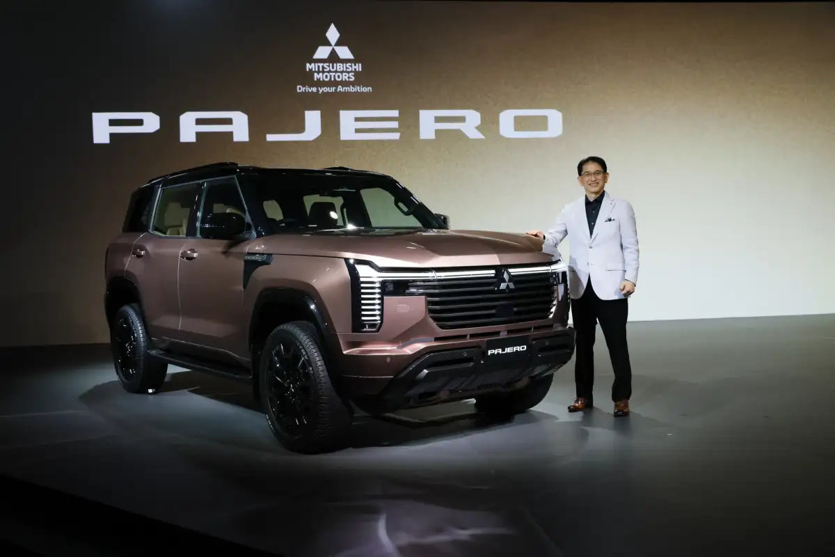 A man stand next to the new Mitsubishi Pajero