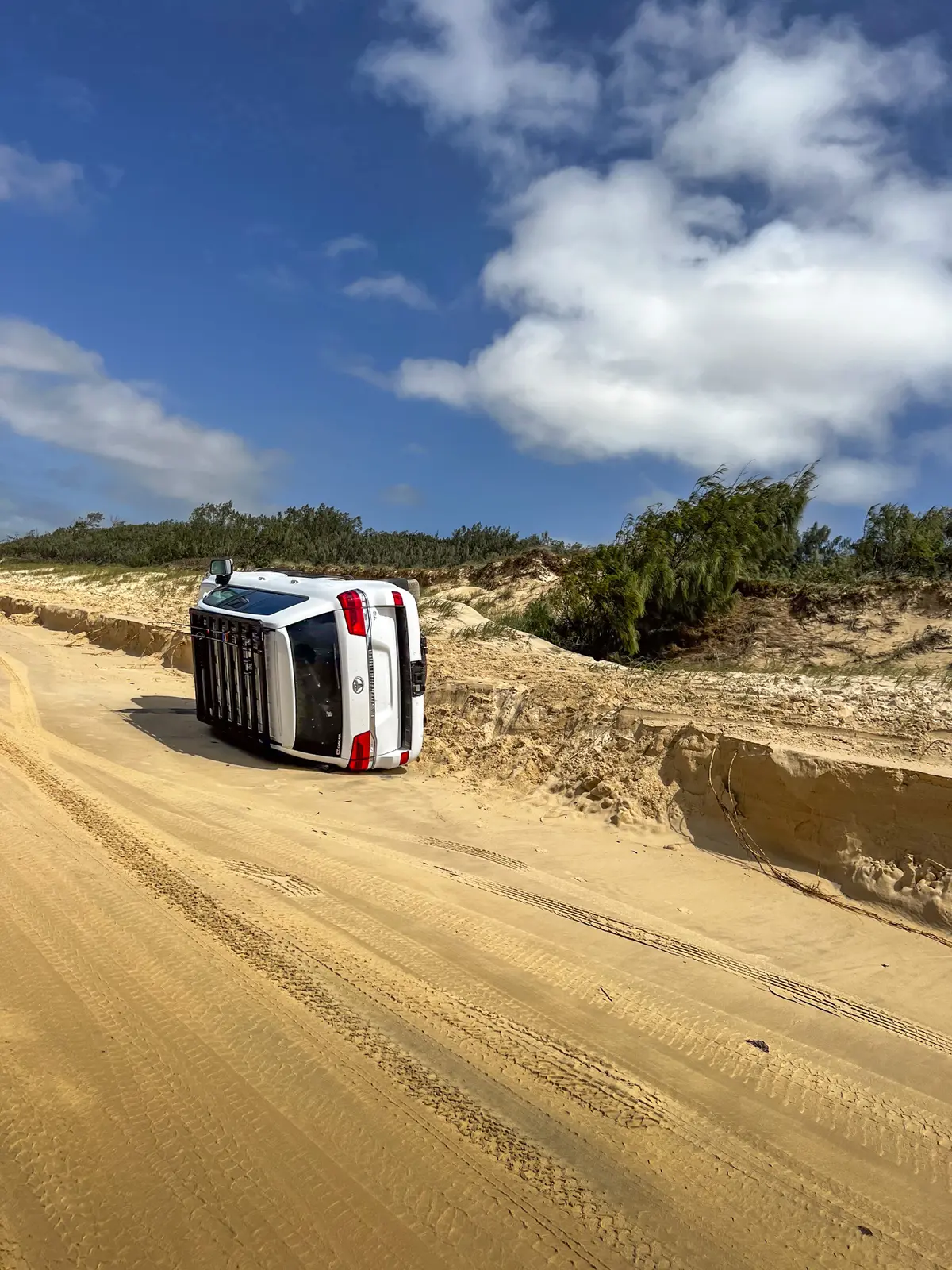 A 4X4 Toyota LandCruiser rolled over on a beach