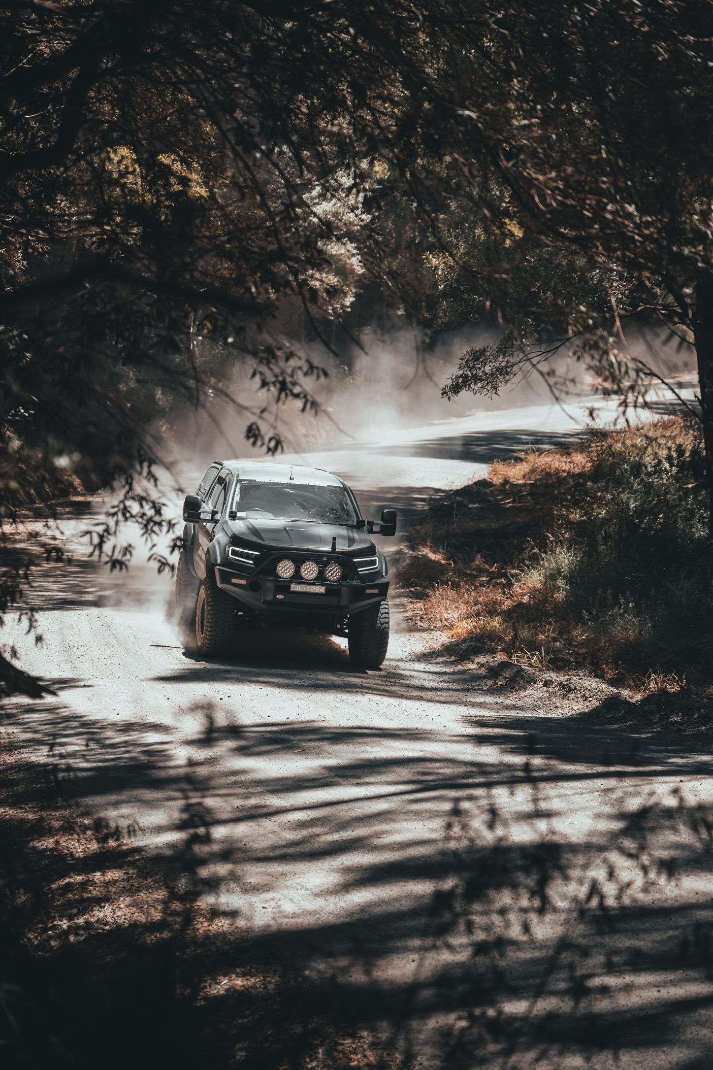 4X4 Ford Ranger driving along gravel road