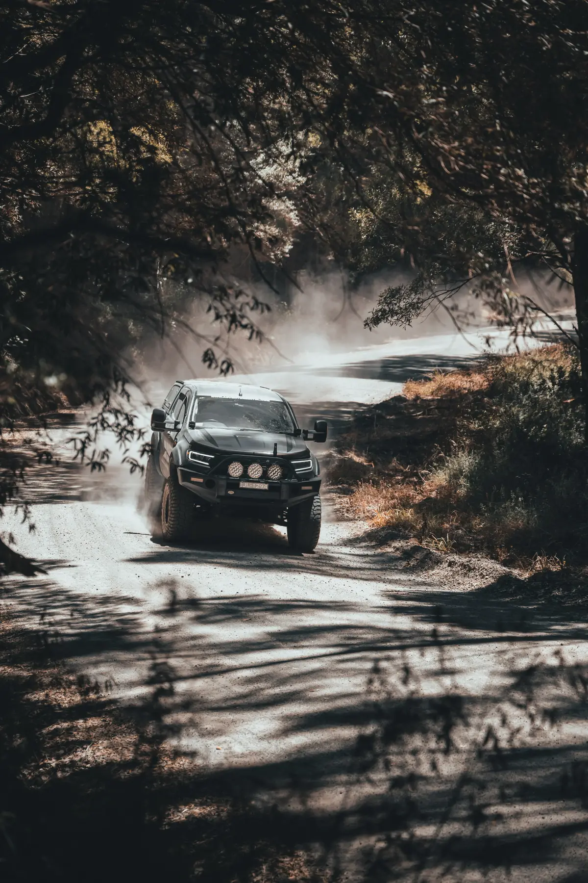 4X4 Ford Ranger driving along gravel road