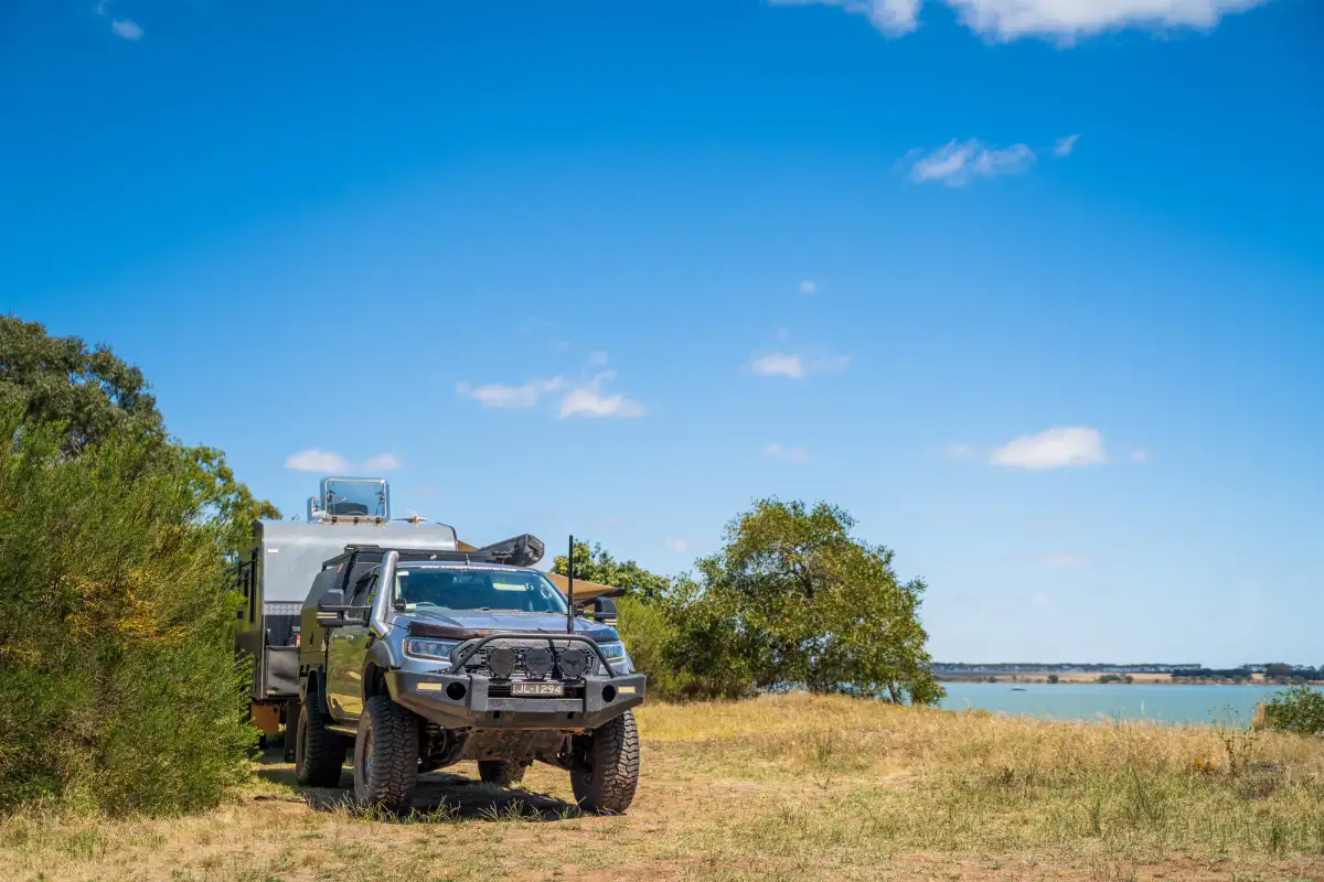 Ford Ranger 4X4 towing a caravan into a campsite