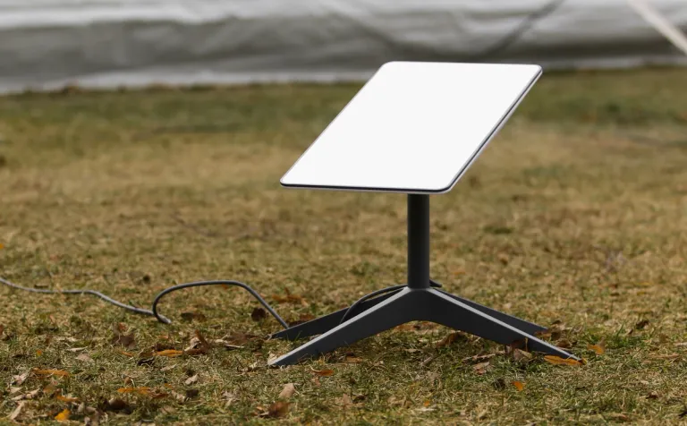 portable starlink unit on grass