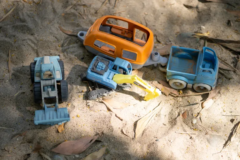 Truck toys in a sandpit