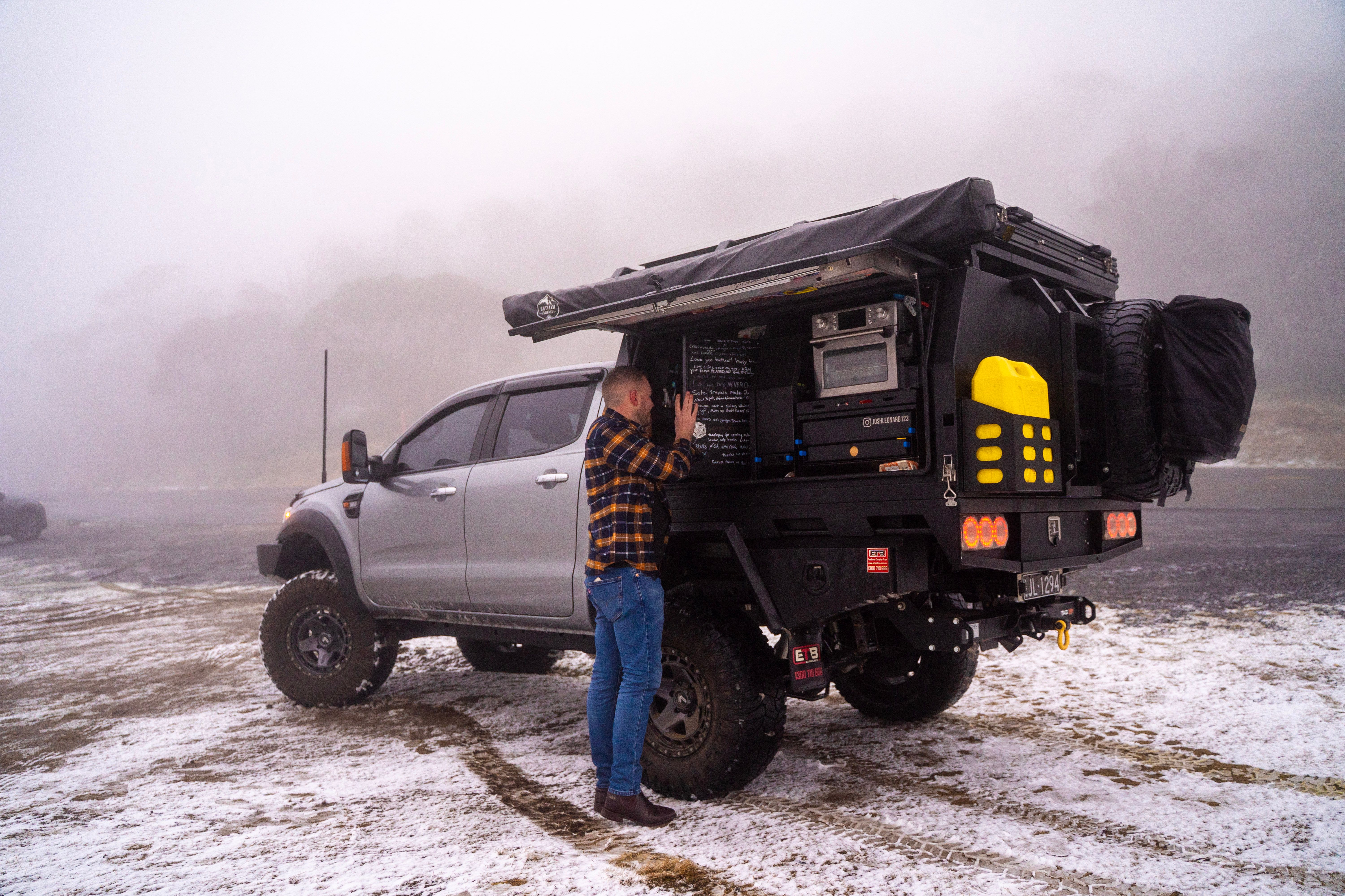 Ford Ranger and man in snow