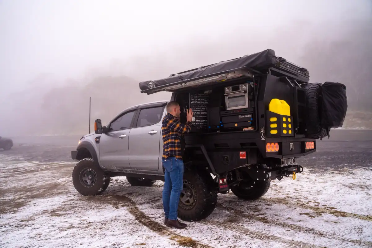 Ford Ranger and man in snow