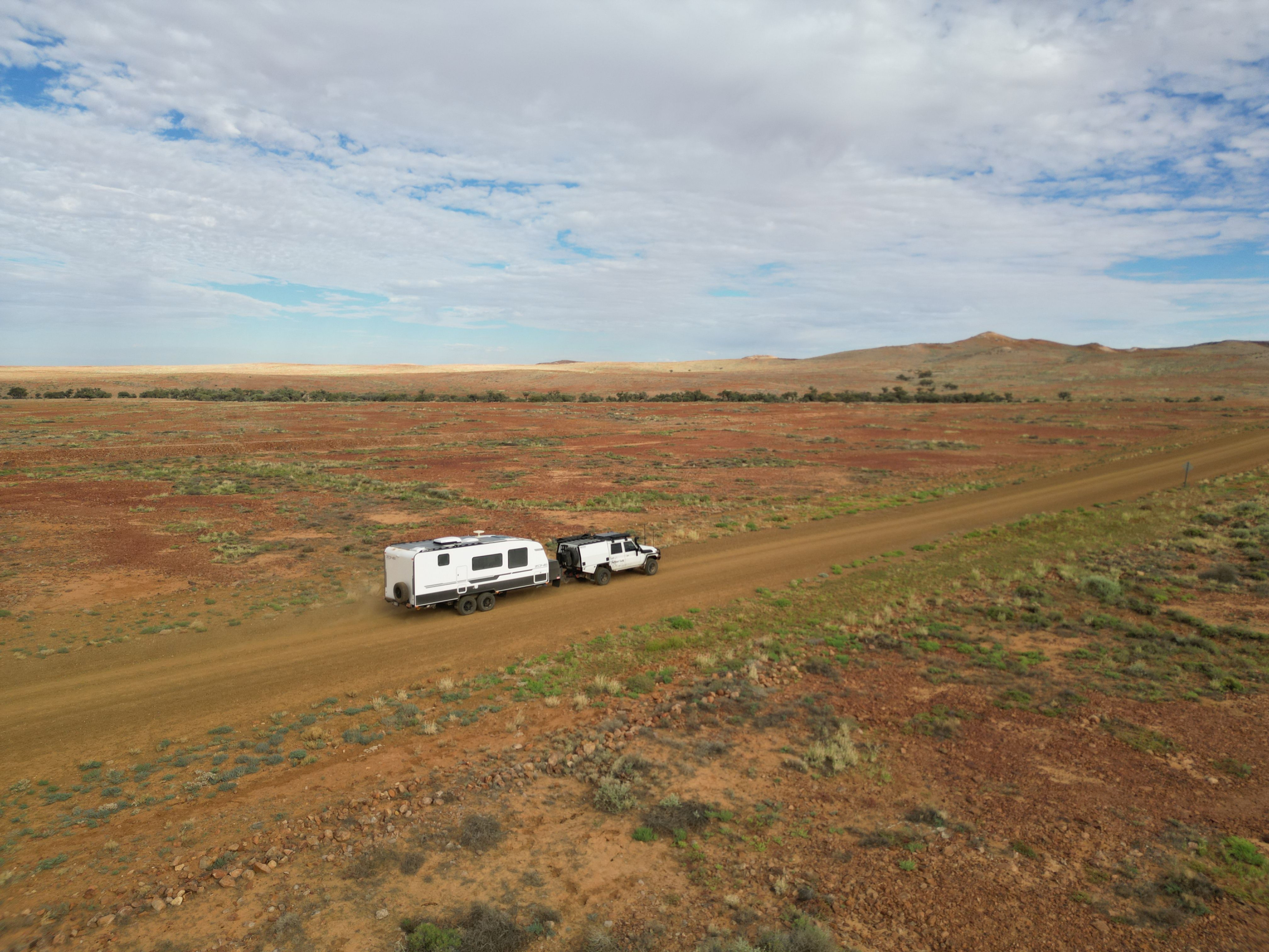 A 4X4 towing a caravan in Outback Australia