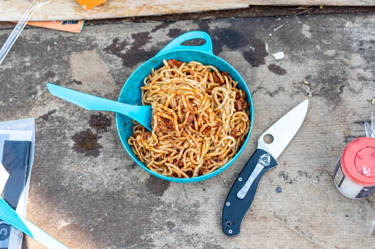 Spaghetti Bolognese in a plastic bowl