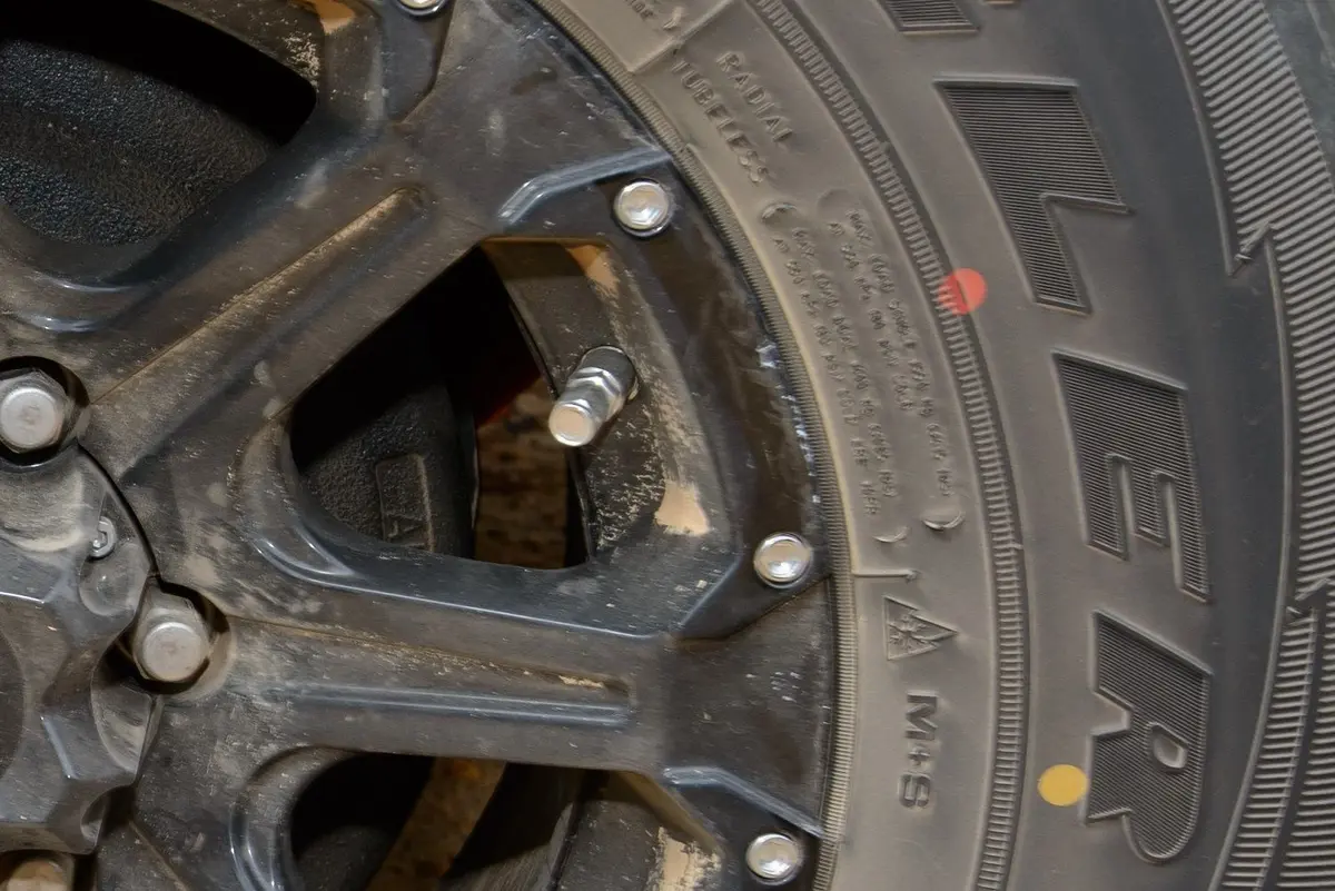 Red And Yellow Dots On A Goodyear Wrangler Tyre