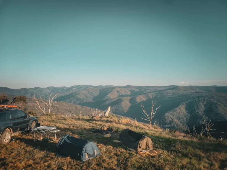 4wd and 2 swags on a mountain in high country