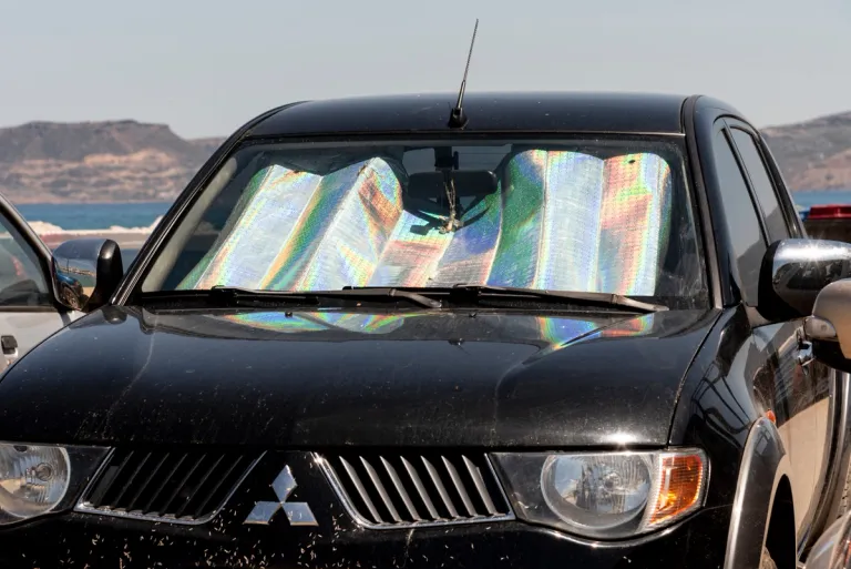 A windshield sunshade on a 4x4