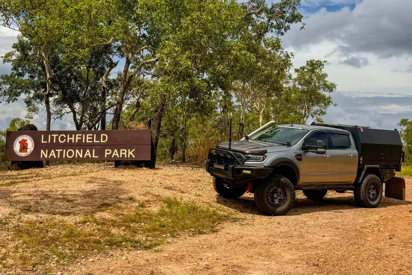4x4 posing next to a sign in the outback