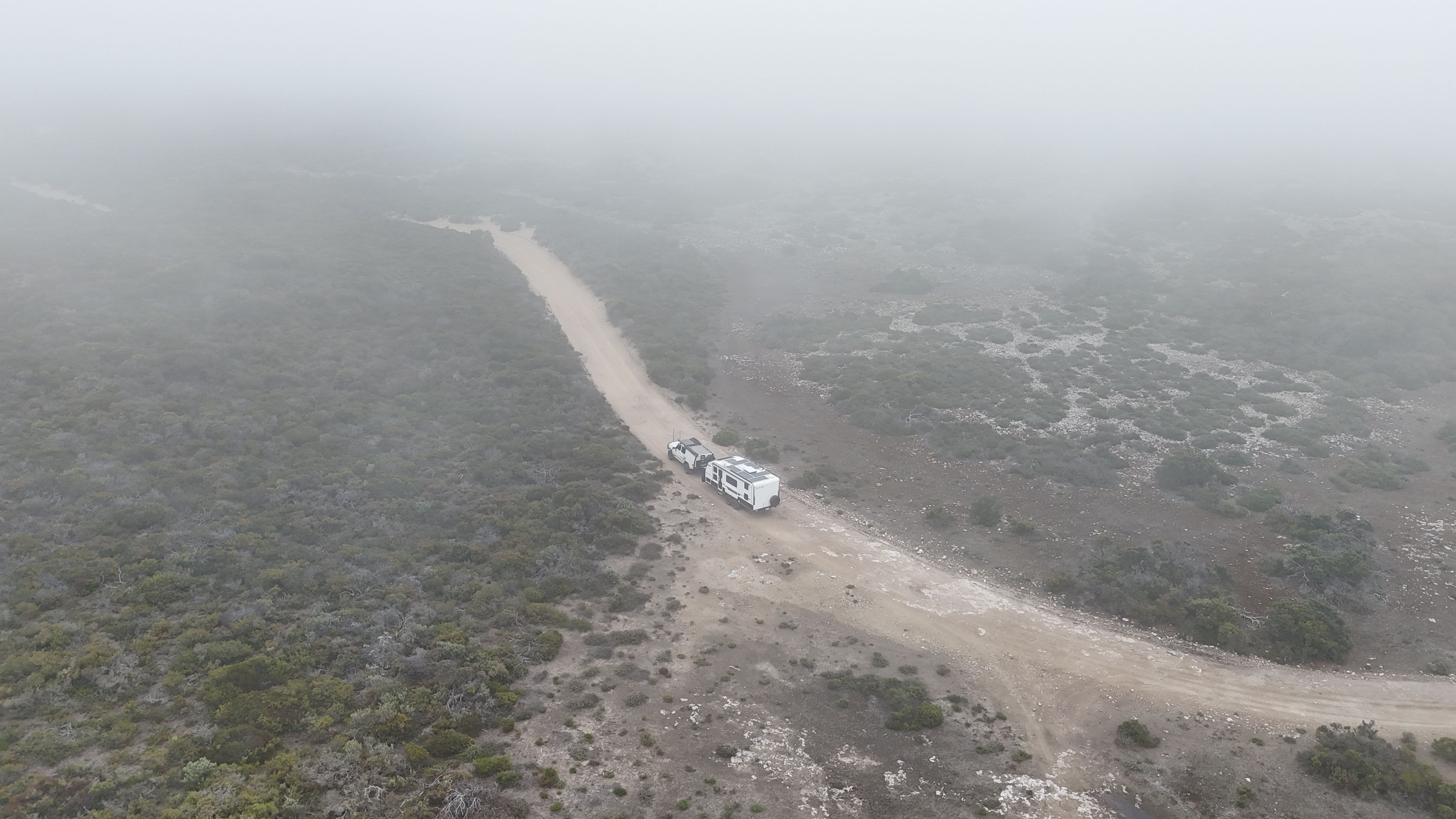 Toyota Landcruiser towing a caravan through Whalers Way