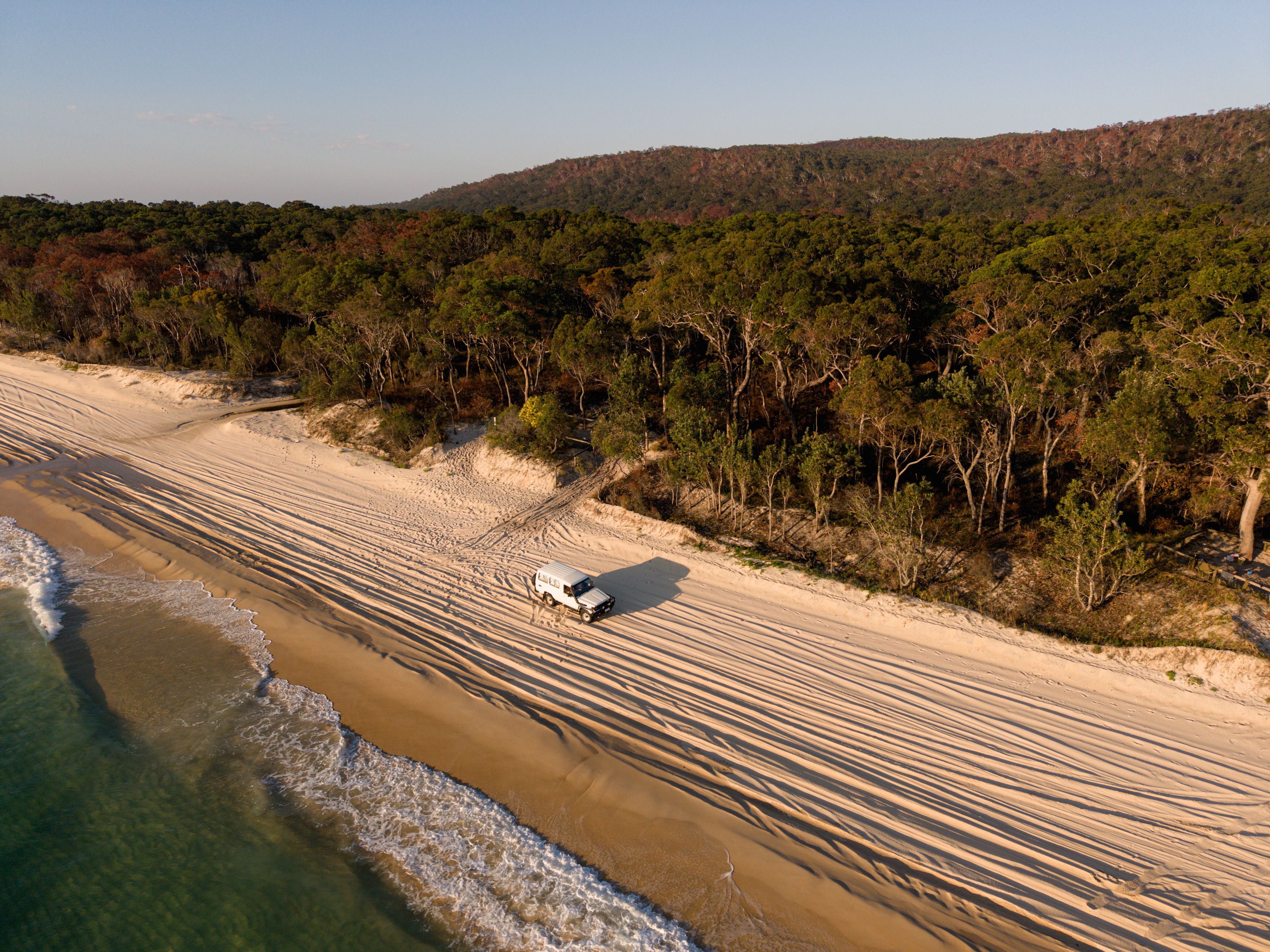 A Toyota LandCruiser driving on Moreton Island